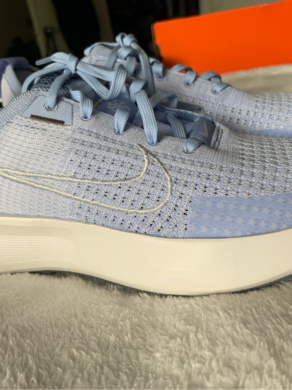 Nike Women’s Pale Blue Knit Running Sneakers